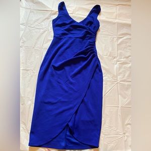 This dress is a formal dress. It’s only been worn once to a wedding.